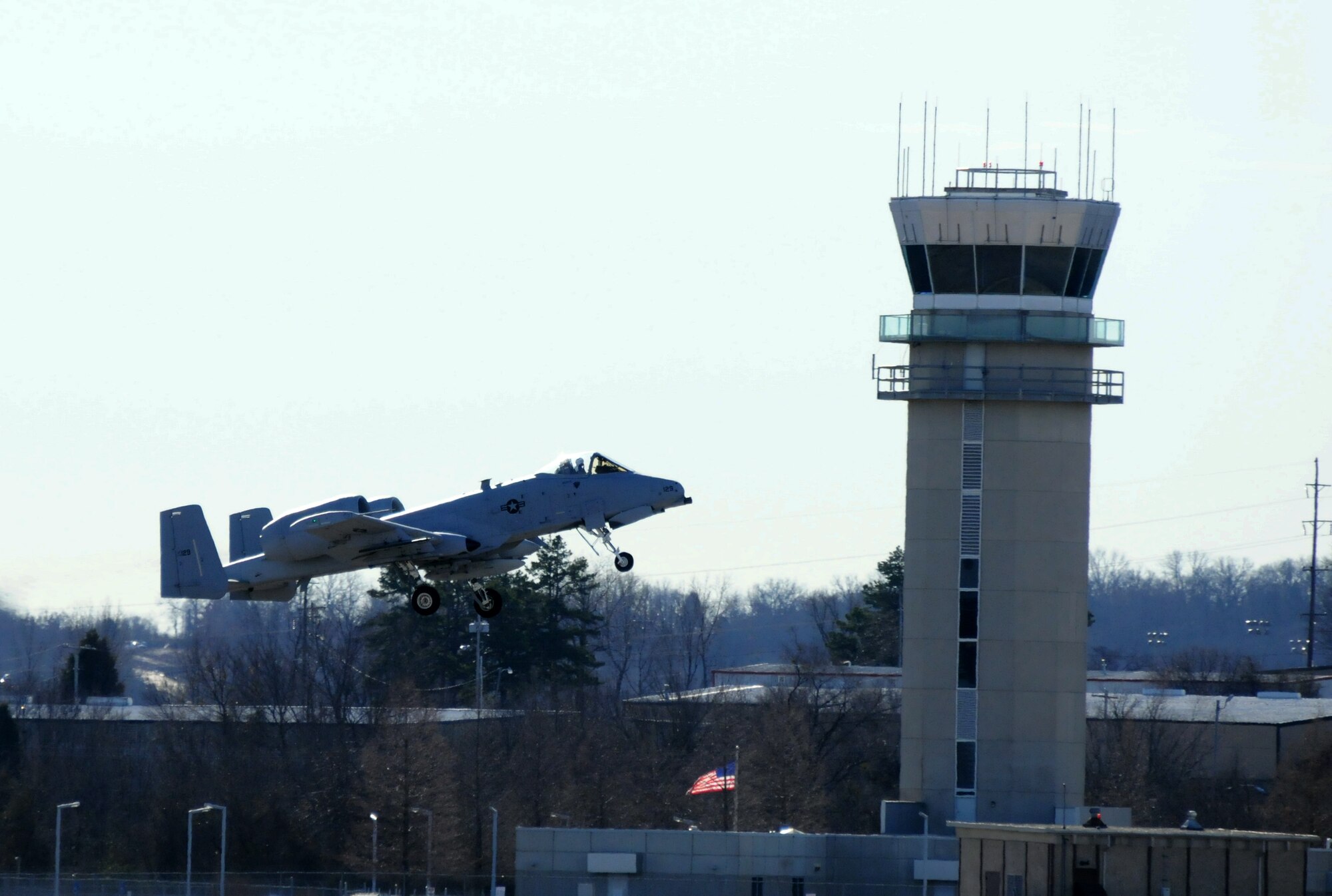 An A-10C Thunderbolt II "Warthog" (Tail No. 0129) departs the 188th Fighter Wing for Moody Air Force Base, Ga., Jan. 15, 2014. Tail Nos. 0129 and 0647 were transferred from the 188th’s Ebbing Air National Guard Base, Fort Smith, Ark., as part of the wing’s on-going conversion from a fighter mission to remotely piloted aircraft and Intelligence mission, which will include a space-focused targeting squadron. The 188th now has nine remaining A-10s left on station. The A-10s will join Moody AFB’s 75th Fighter Squadron. (U.S. Air National Guard photo by Tech Sgt. Josh Lewis/188th Fighter Wing Public Affairs)