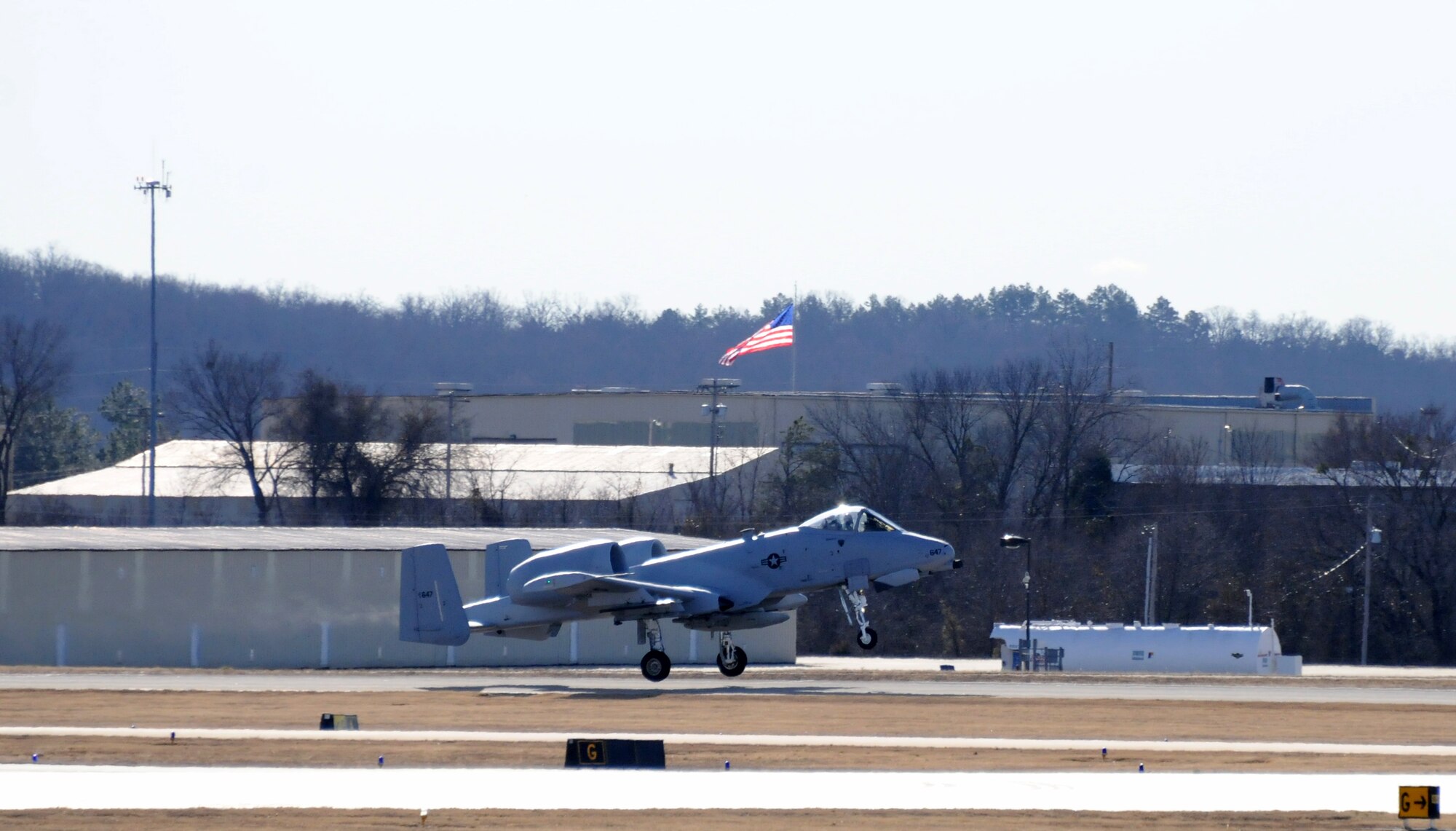 An A-10C Thunderbolt II "Warthog" (Tail No. 0647) departs the 188th Fighter Wing for Moody Air Force Base, Ga., Jan. 15, 2014. Tail Nos. 0129 and 0647 were transferred from the 188th’s Ebbing Air National Guard Base, Fort Smith, Ark., as part of the wing’s on-going conversion from a fighter mission to remotely piloted aircraft and Intelligence mission, which will include a space-focused targeting squadron. The 188th now has nine remaining A-10s left on station. The A-10s will join Moody AFB’s 75th Fighter Squadron. (U.S. Air National Guard photo by Tech Sgt. Josh Lewis/188th Fighter Wing Public Affairs)