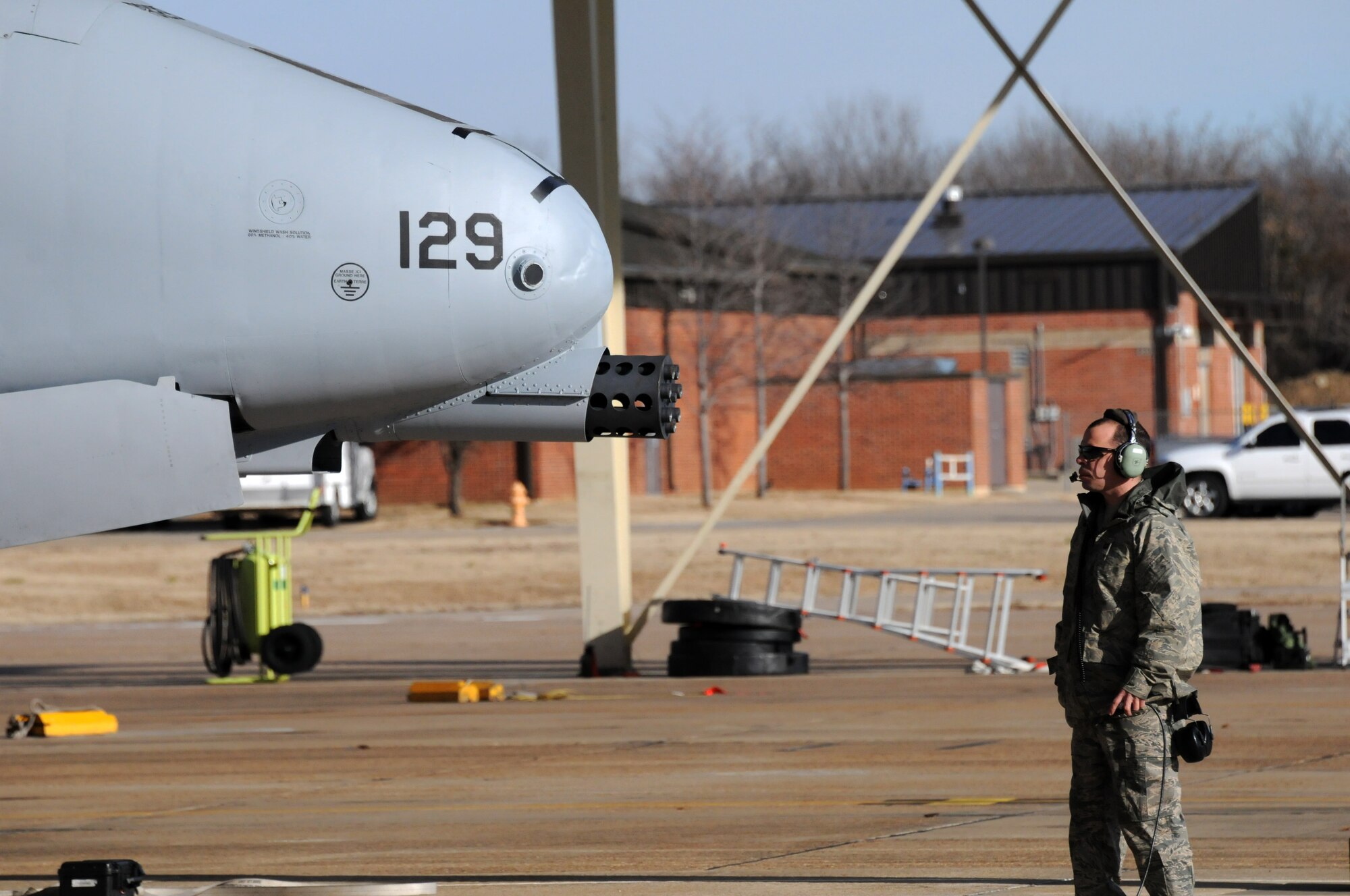 Master Sgt. Jay Greer, a crew chief with the 188th Aircraft Maintenance Squadron, preps an A-10C Thunderbolt II "Warthog" (Tail No. 0647) for departure to Moody Air Force Base, Ga., Jan. 15, 2014. Tail Nos. 0129 and 0647 were transferred from the 188th Fighter Wing’s Ebbing Air National Guard Base, Fort Smith, Ark., as part of the wing’s on-going conversion from a fighter mission to remotely piloted aircraft and Intelligence mission, which will include a space-focused targeting squadron. The 188th now has nine remaining A-10s left on station. The A-10s will join Moody AFB’s 75th Fighter Squadron. (U.S. Air National Guard photo by Tech Sgt. Josh Lewis/188th Fighter Wing Public Affairs)
