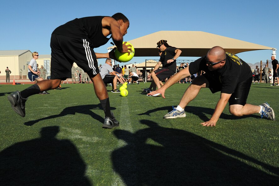 432nd Wing/432nd Air Expeditionary Wing Airmen participate in a dodgeball tournament as part of the Comprehensive Airmen Fitness Day Aug. 9. (U.S. Air Force photo by Staff Sgt. N.B.)