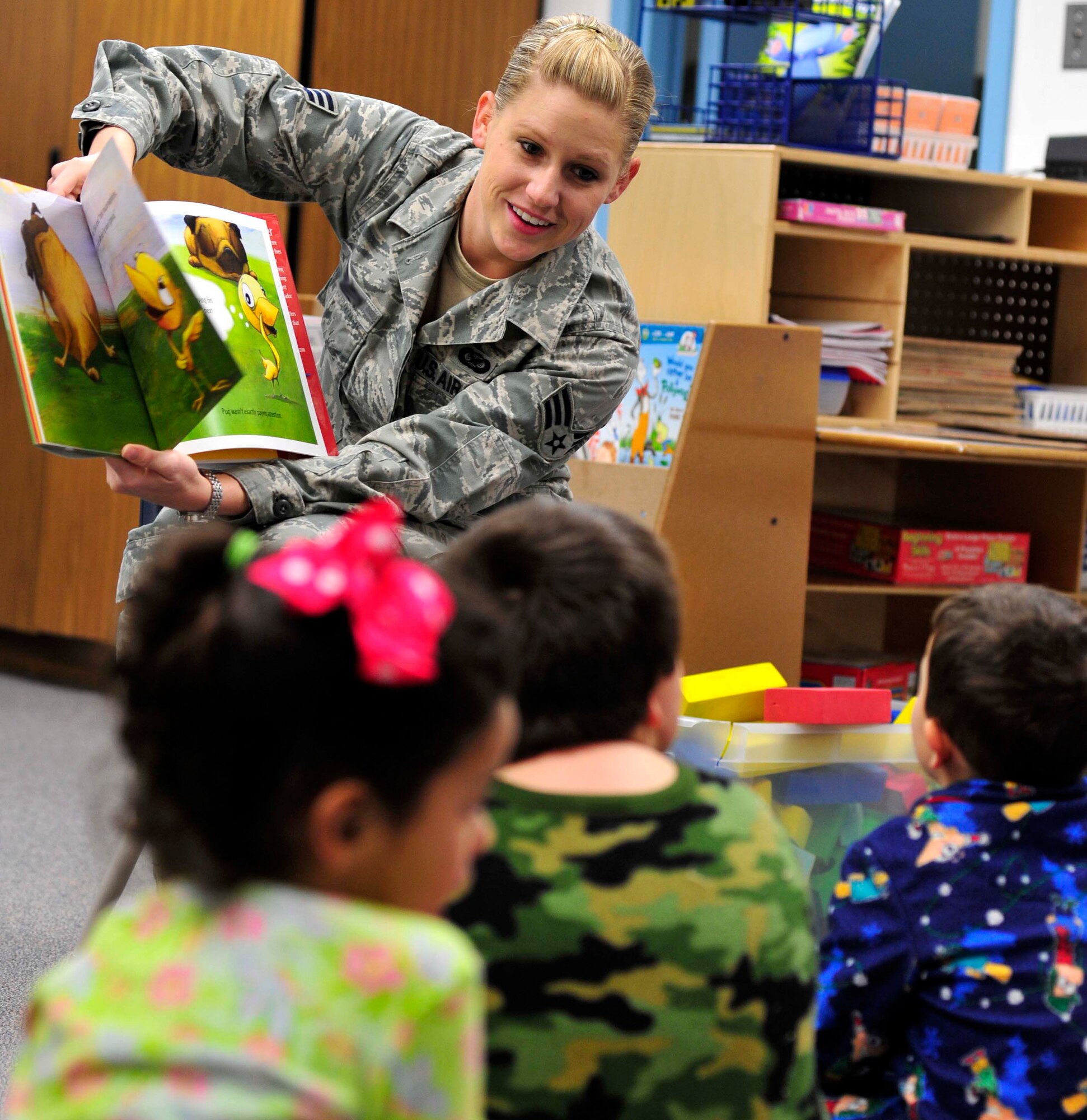 An Airman from the 432nd Wing reads to students at the Indian Springs Elementary School Feb. 27 during Nevada Reading Week. (U.S. Air Force photo by Staff Sgt. A.D.)