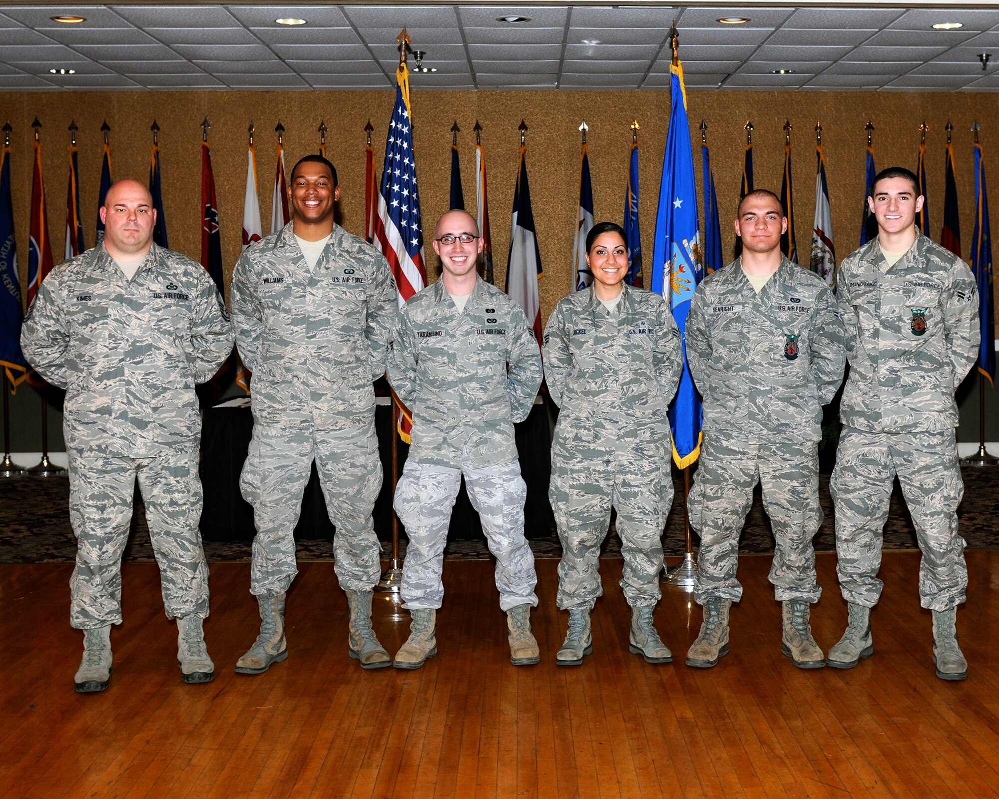 Six of Team BLAZE’s newly promoted enlisted Airmen sewed on their next stripe at the enlisted promotions ceremony at the Columbus Club on Dec. 30. (U.S. Air Force photo/Sharon Ybarra)