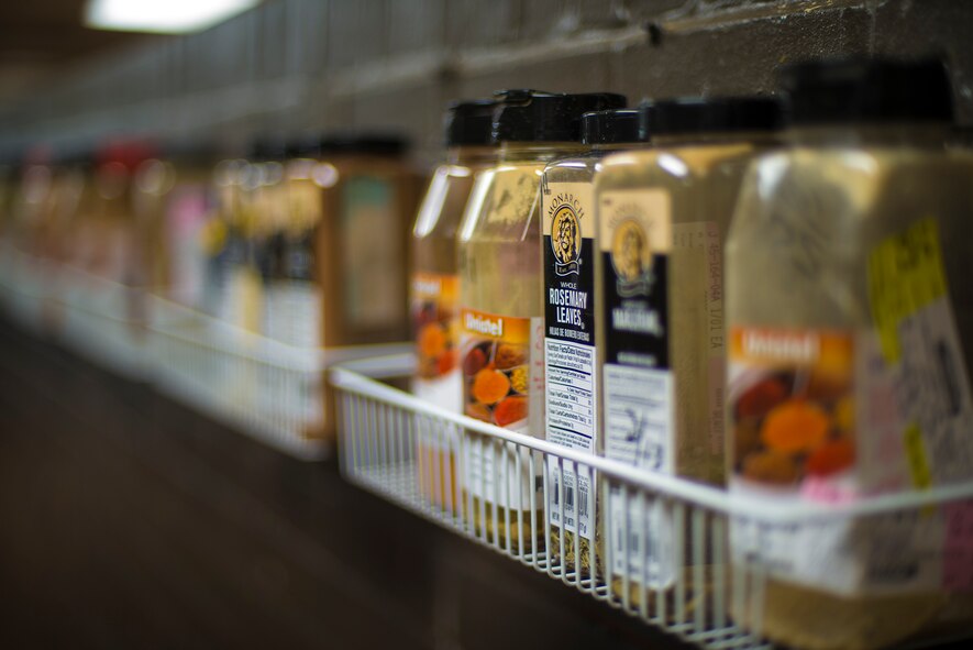 Georgia Pines Dining Facility Airmen use a variety of spices for their culinary creations at Moody Air Force Base, Ga., Dec. 12, 2013. DFAC Airmen rely on taste-tests to hand pick spices and make dishes their own. (U.S. Air Force photo by Airman 1st Class Ryan Callaghan/Released)
