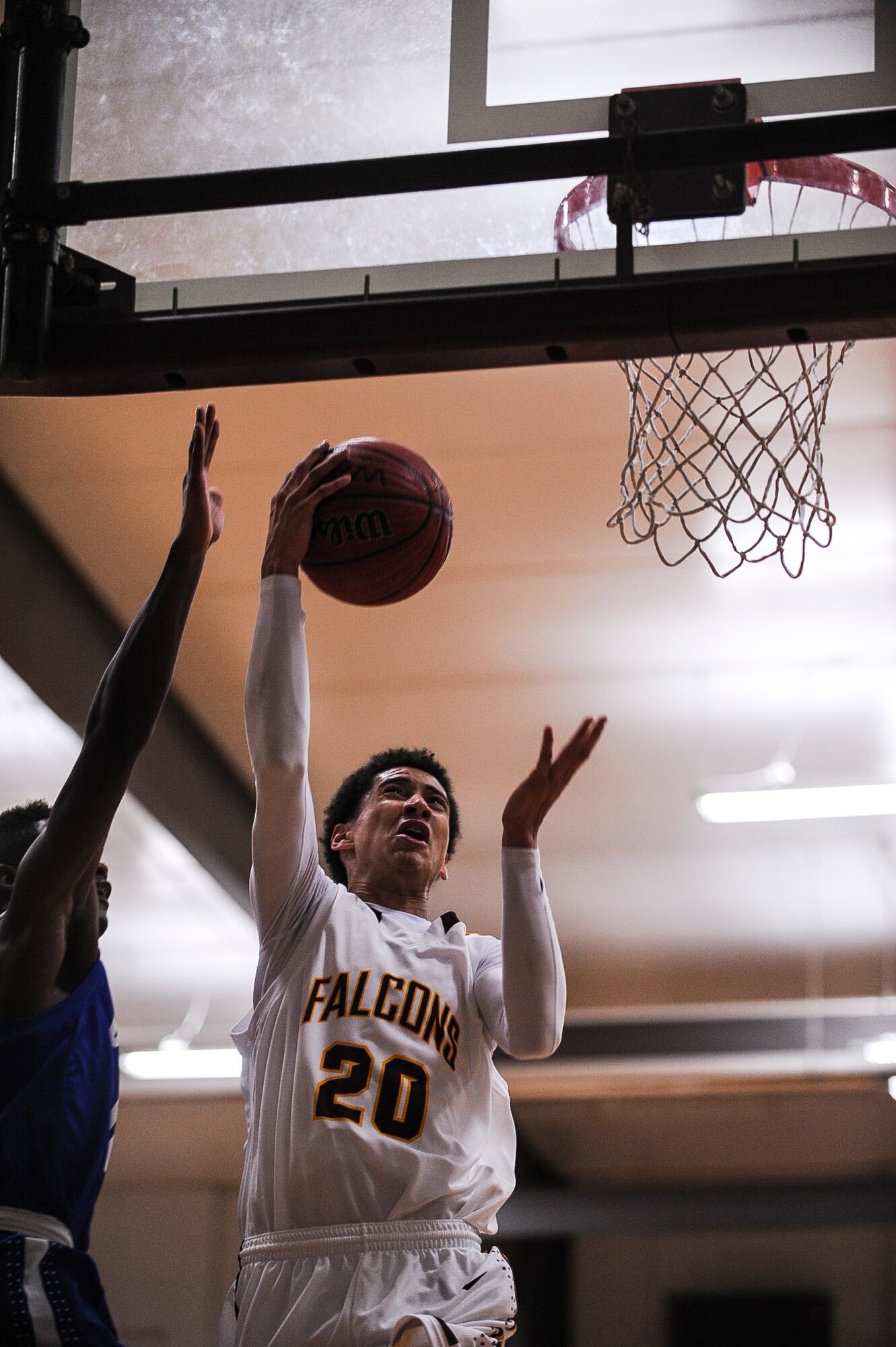 Joseph Aikens, a North Pulaski Falcons point guard, soars for a lay-up November 26, 2013, at North Pulaski High School. (U.S. Air Force photo by Airman 1st Class Cliffton Dolezal) 