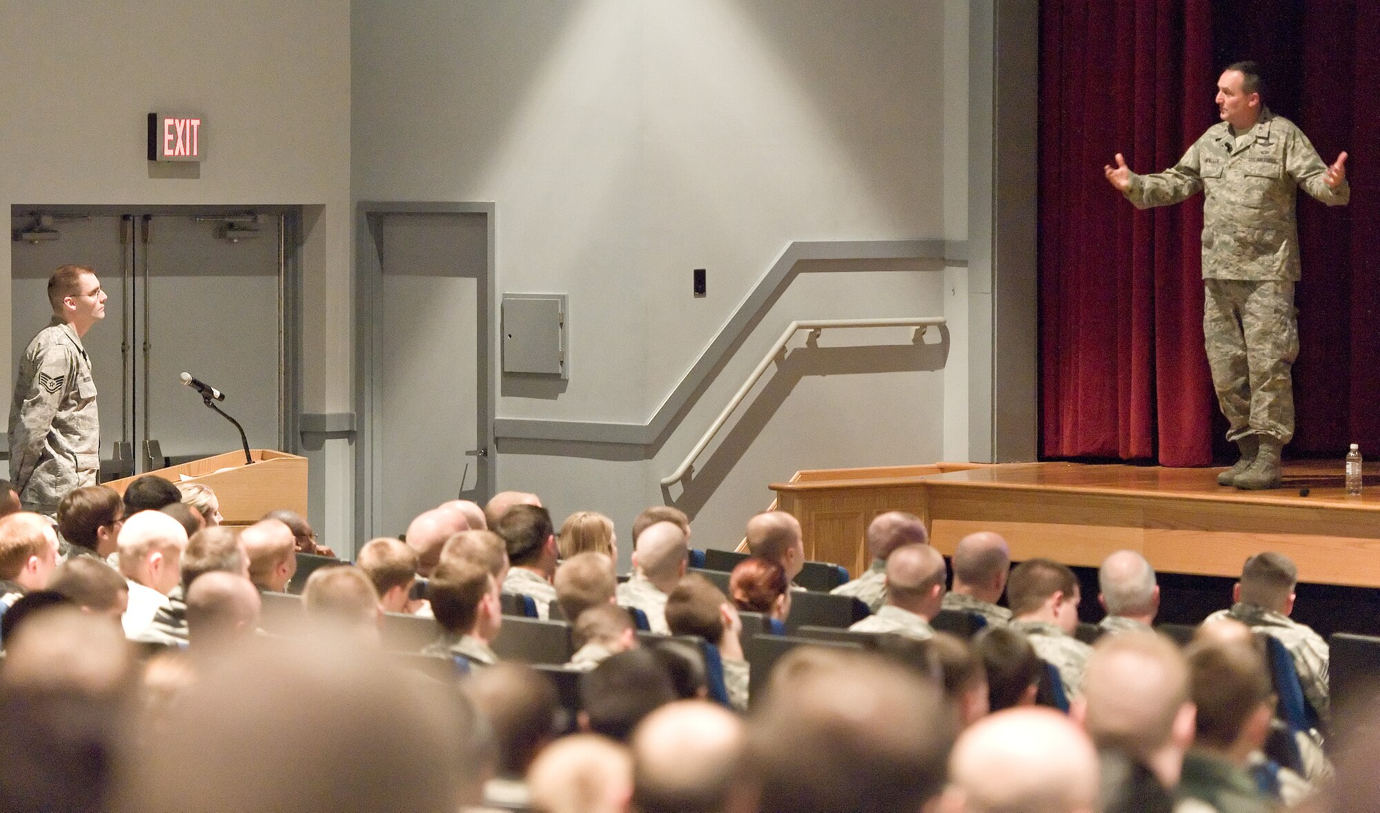 Lt. Gen. Stephen Mueller, Secretary of the Air Force Inspector General, right, answers a question from Staff Sgt. Thomas Nuckols, 436th Medical Support Squadron, Jan. 14, 2014, at the Base Theater on Dover Air Force Base, Del. Nuckols asked Lt. Gen. Mueller if the IG was going to standardize the timing of new checklist distribution. (U.S. Air Force photo/Roland Balik)