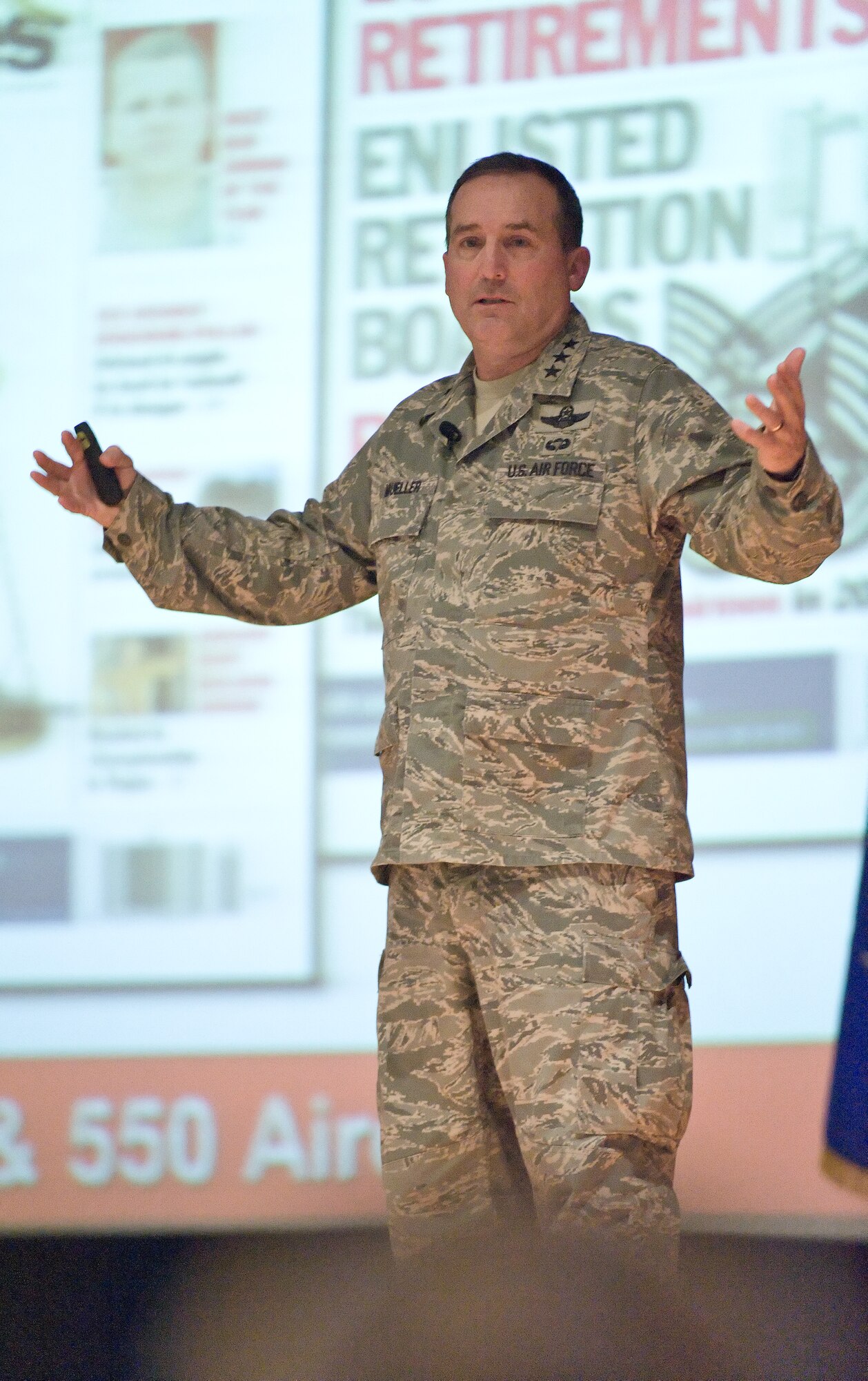 Lt. Gen. Stephen Mueller, Secretary of the Air Force Inspector General briefs Team Dover members Jan. 14, 2014, at the Base Theater on Dover Air Force Base, Del. Lt. Gen. Mueller highlighted the eight goals of the new inspection system. (U.S. Air Force photo/Roland Balik)