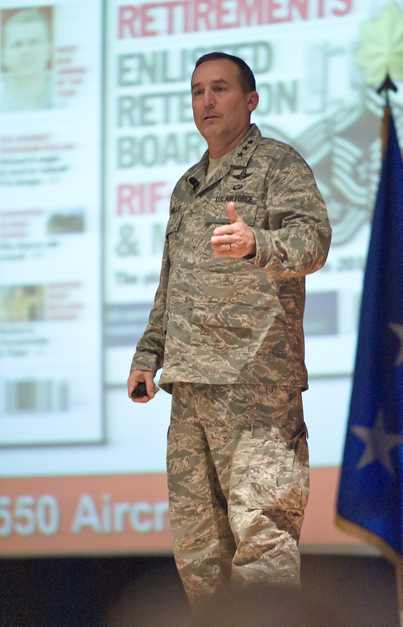 Lt. Gen. Stephen Mueller, Secretary of the Air Force Inspector General briefs Team Dover members Jan. 14, 2014, at the Base Theater on Dover Air Force Base, Del. Lt. Gen. Mueller talked about recent changes in the Air Force and how it has affected the Air Force inspection system. (U.S. Air Force photo/Roland Balik)
