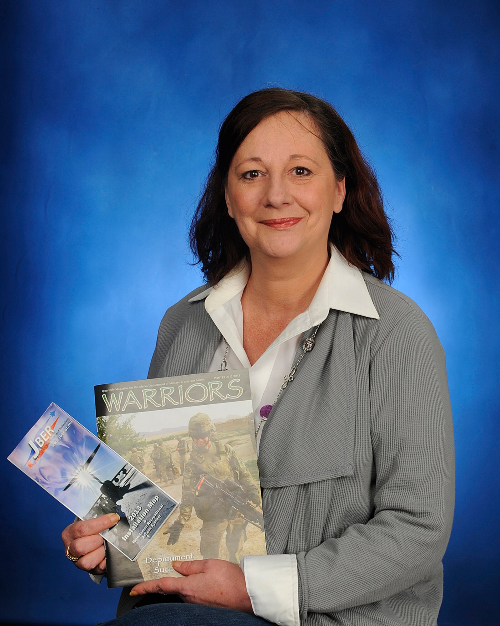 Petra Cooke regularly helps military wives and spouses new to the military on a regular basis at Joint Base Elmendorf-Richardson. Cooke is the wife of Army Master Sgt. Travis Cooke, acting first sergeant for Comanche Company, 1st Battalion (Airborne), 501st Infantry Regiment, 4th Infantry Brigade Combat Team (Airborne), 25th Infantry Division. She is a native of Berlin, Germany. (U.S. Air Force photo/Staff Sgt. Robert Barnett)