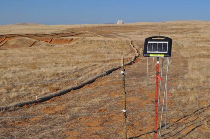 Electric fences surrounded six of the seven sites in order to keep cattle out during the restoration process at Beale Air Force Base, Calif. The Beale Military Munitions Response Program excavated more than 17,000 tons of contaminated top soil as part of the Interim Removal Action for seven small arms munitions response sites. (Courtesy photo/Released)