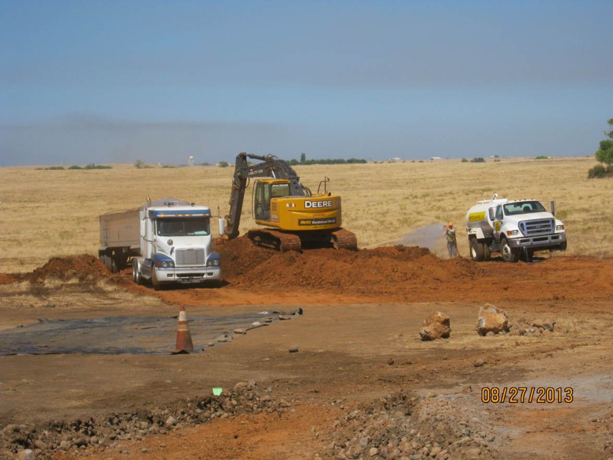 Contractors excavate contaminated soil Aug. 27, 2013, as part of the Interim Removal Action for seven small arms munitions response sites at Beale Air Force Base, Calif. The project removed the lead and polycyclic aromatic hydrocarbons that contaminated the soil and prevented any future fines and environmental expenses for the base. (Courtesy photo/Released)