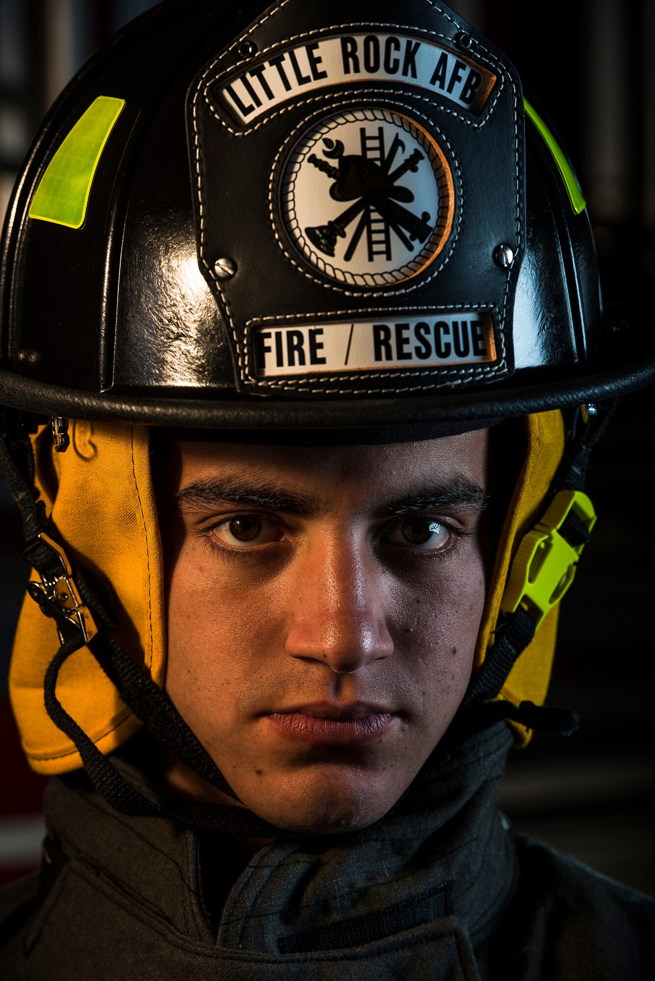 Airman First Class Joseph Minnick, a 19th Airlift Wing fire fighter, works on the A-Shift at Little Rock Air Force Base, Ark. The department, comprised of 49 Airmen and seven civilians, operates on two 24-hour shifts that respond to nearly 700 emergency calls each year. (U.S. Air Force photo by Tech. Sgt. Russ Scalf)