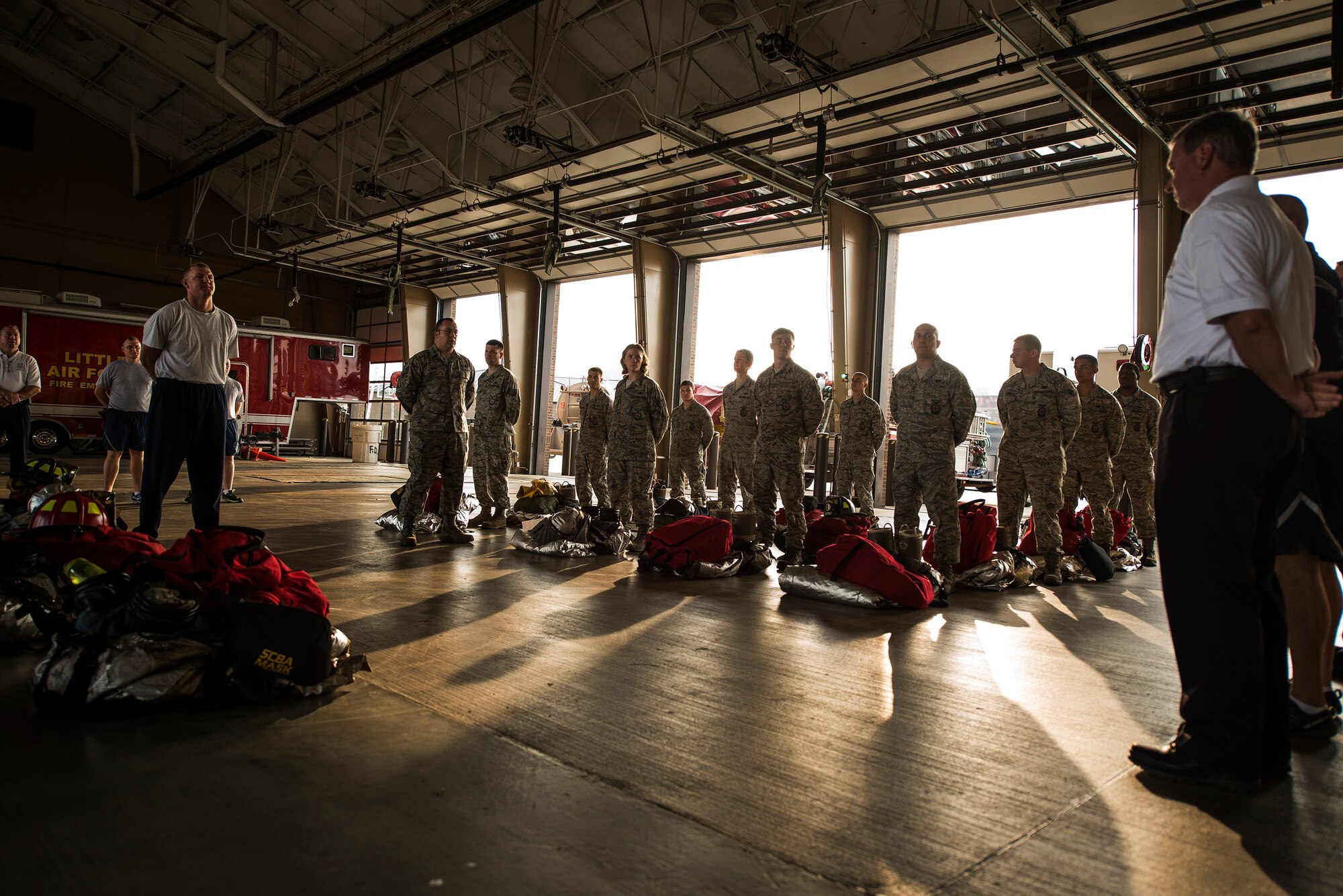 19th Airlift Wing firefighters meet for roll call Aug. 12, 2013 at Little Rock Air Force Base, Ark. Every morning at 8 a.m. both shifts meet to conduct a change over. (U.S. Air Force photo by Tech. Sgt. Russ Scalf)