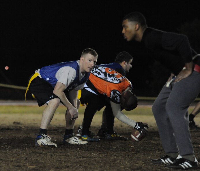 Senior Airman Sean McFadden, 2nd Security Forces Squadron guard, watches his man during the intramural flag football championship on Barksdale Air Force Base, La., Jan. 13, 2014. The 2nd SFS defeated 2nd Aircraft Maintenance Squadron 13-0 in the final game to win the title. (U.S. Air Force photo/ Staff Sgt. Sean Martin)
