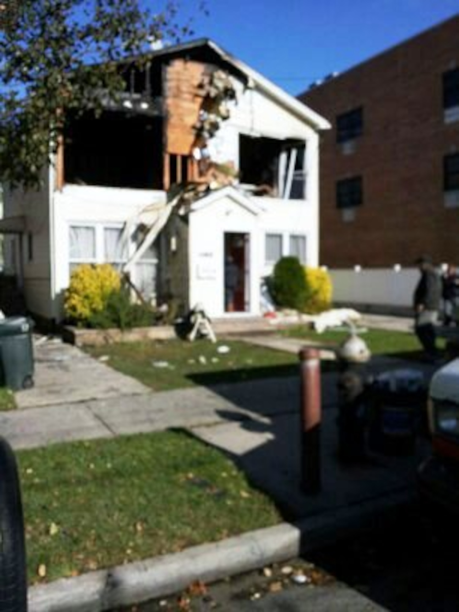 A view of the damage caused to the second and third floor of Senior Airman Julius Guest's Queens home immediately following Hurricane Sandy Oct. 2012. Guest, a knowledge operations manager at the 514th Air Mobility Wing, and his wife were only able to retrieve a few items they were able to salvage and were forced to move in with their in-laws nearby until the Federal Emergency Management Agency evaluated their losses. Since March of last year, the couple has since relocated to another home in a nearby neighborhood (Courtesy photo).