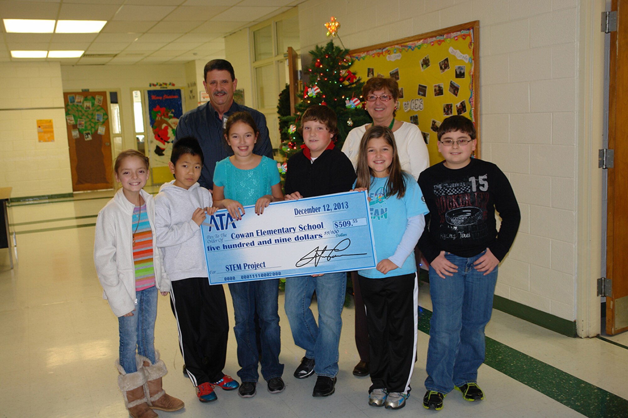 ATA recently donated $509.55 to the Cowan Elementary School toward the purchase of LEGO Techno Packs, a Science, Technology, Engineering and Mathematics (STEM) related learning tool for building simple machines. Shown in this photo (front row, l-r) are Cowan Elementary School students Reagan Sherrill, Sora Okawa, Lucy Barnes, Trenton Boswell, Carmen Guess and Peyton Garner; (back row, l-r) Ted Boswell, representative from the ATA Employee and Community Activity Committee, and Debra Skotte, Cowan Elementary School teacher. (Photo provided)