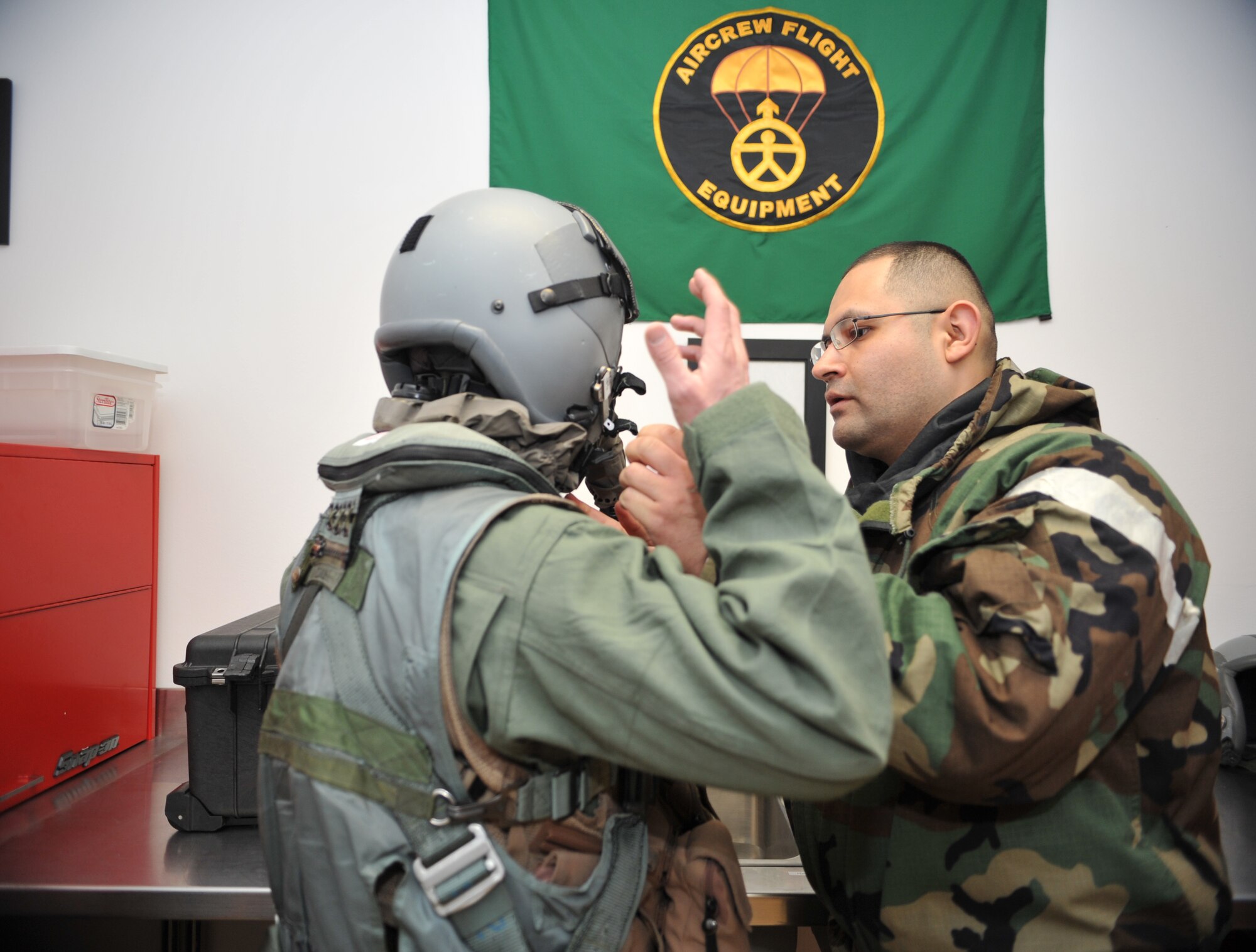 A 25th Fighter Squadron A-10 Thunderbolt II pilot is fitted with chemical, biological, radiological and nuclear threat protection flight gear by a member of the 51st Operations Support Squadron Aircrew Flight Equipment section during a training scenario as part of Operational Readiness Exercise Beverly Midnight 14-01 at Osan Air Base, Republic of Korea, Jan. 15, 2014. The drill allowed both the pilots and the AFE team to practice preparing for flying missions in a potentially CBRN-contaminated environment. (U.S. Air Force photo/Airman 1st Class Ashley J. Thum) 