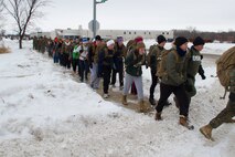 Recruiting Station Milwaukee’s female poolees test their endurance with a four mile training hike in Madison, Wis., Jan. 4, 2014. This annual pool function gives female poolees a rare chance to interact with female Marines and other poolees from around the state before recruit training.