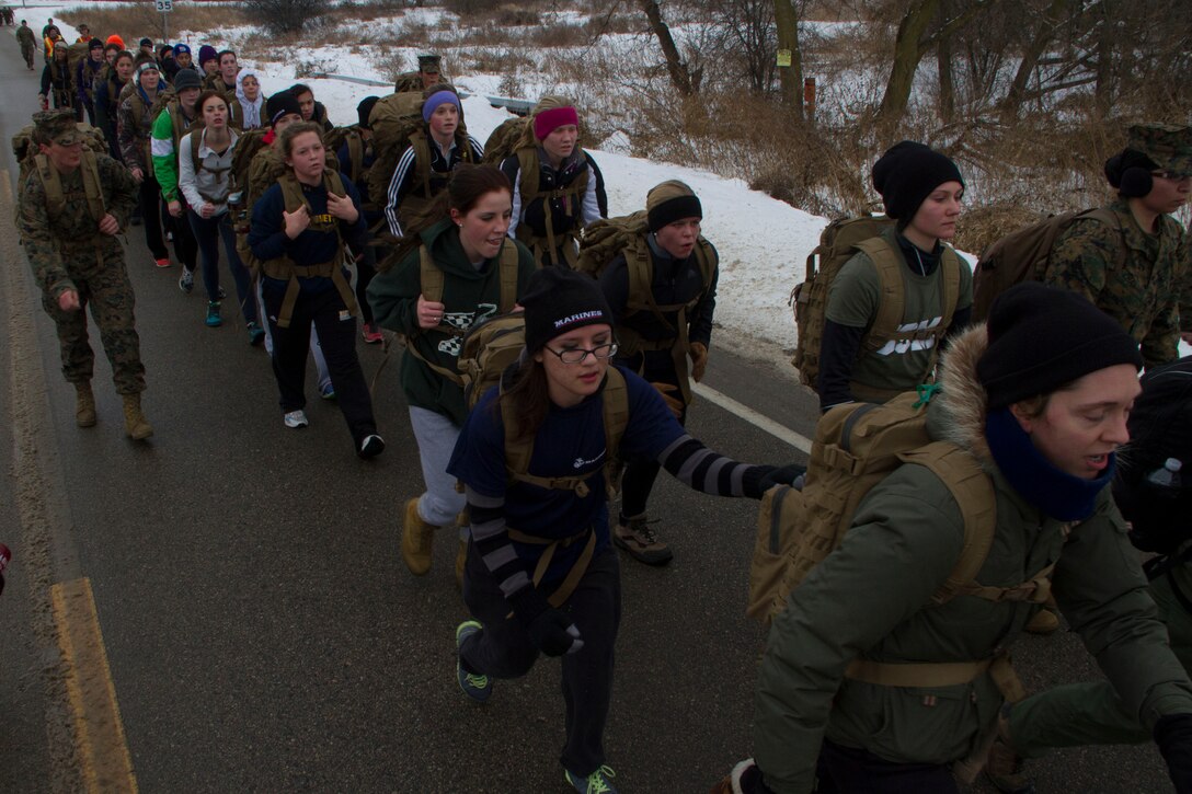 Recruiting Station Milwaukee’s female poolees test their endurance with a four mile training hike in Madison, Wis., Jan. 4, 2014. This annual pool function gives female poolees a rare chance to interact with female Marines and other poolees from around the state before recruit training.