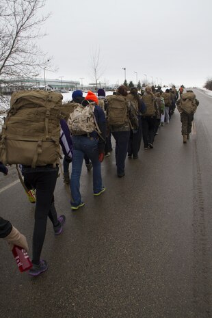 Recruiting Station Milwaukee’s female poolees test their endurance with a four mile training hike in Madison, Wis., Jan. 4, 2014. This annual pool function gives female poolees a rare chance to interact with female Marines and other poolees from around the state before recruit training.