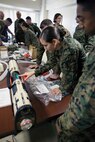 Naval medical personnel execute the startup process of the mobile, oxygen, ventilation and external suction system Jan. 7 at Camp Kinser. The sailors are with 3rd Medical Battalion, 3rd Marine Logistics Group, III Marine Expeditionary Force.