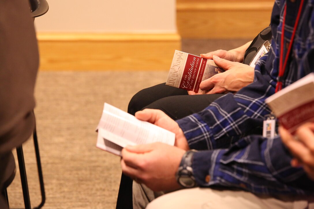 The Marines Corps Communication School Staff NCO's and Officers were given a pocket sized version of the U.S. Constitution at the National Archives in Washington D.C. on Thursday Jan. 16, 2014. The Constitution was used by the Marines to determine whether an historical document was supported by it. 