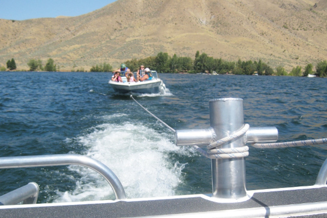 Boaters on Lucky Peak Lake receive a tow back to the ramp.