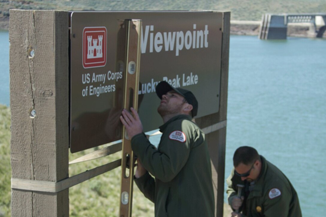 Park Rangers install a new identification sign at Lucky Peak Lake’s Viewpoint.