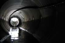 Looking out a cone valve on Lucky Peak Dam’s Auxilliary Tunnel.