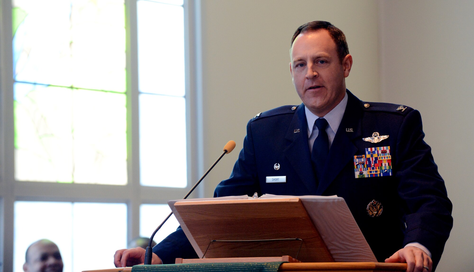 Col. Christopher Short, 366th Fighter Wing commander, shares his thoughts on the Rev. Dr. Martin Luther King Jr., during a birthday observance Jan. 17, 2013 at Mountain Home Air Force Base, Idaho. Guest speakers read excerpts from King’s speeches and honored his legacy. (U.S Air Force photo by Airman 1st Class Malissa Lott/ Released)