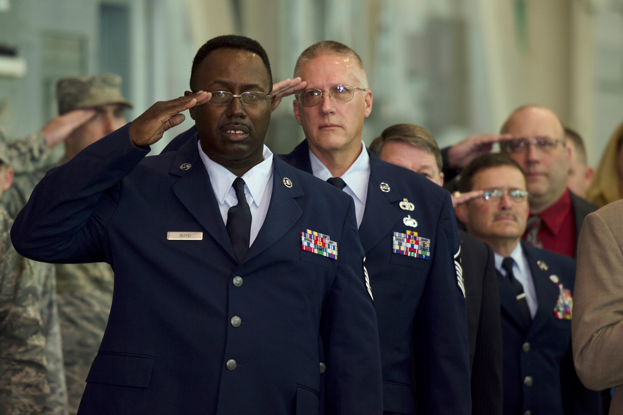 U.S. Air Force retired Airmen of the 169th Fighter Wing at McEntire Joint National Guard Base, South Carolina Air National Guard, assemble for a mass formation to recognize retirees and yearly award winners in the hangar, Jan. 12, 2014.    (U.S. Air National Guard photo by Tech. Sgt. Jorge Intriago/Released)