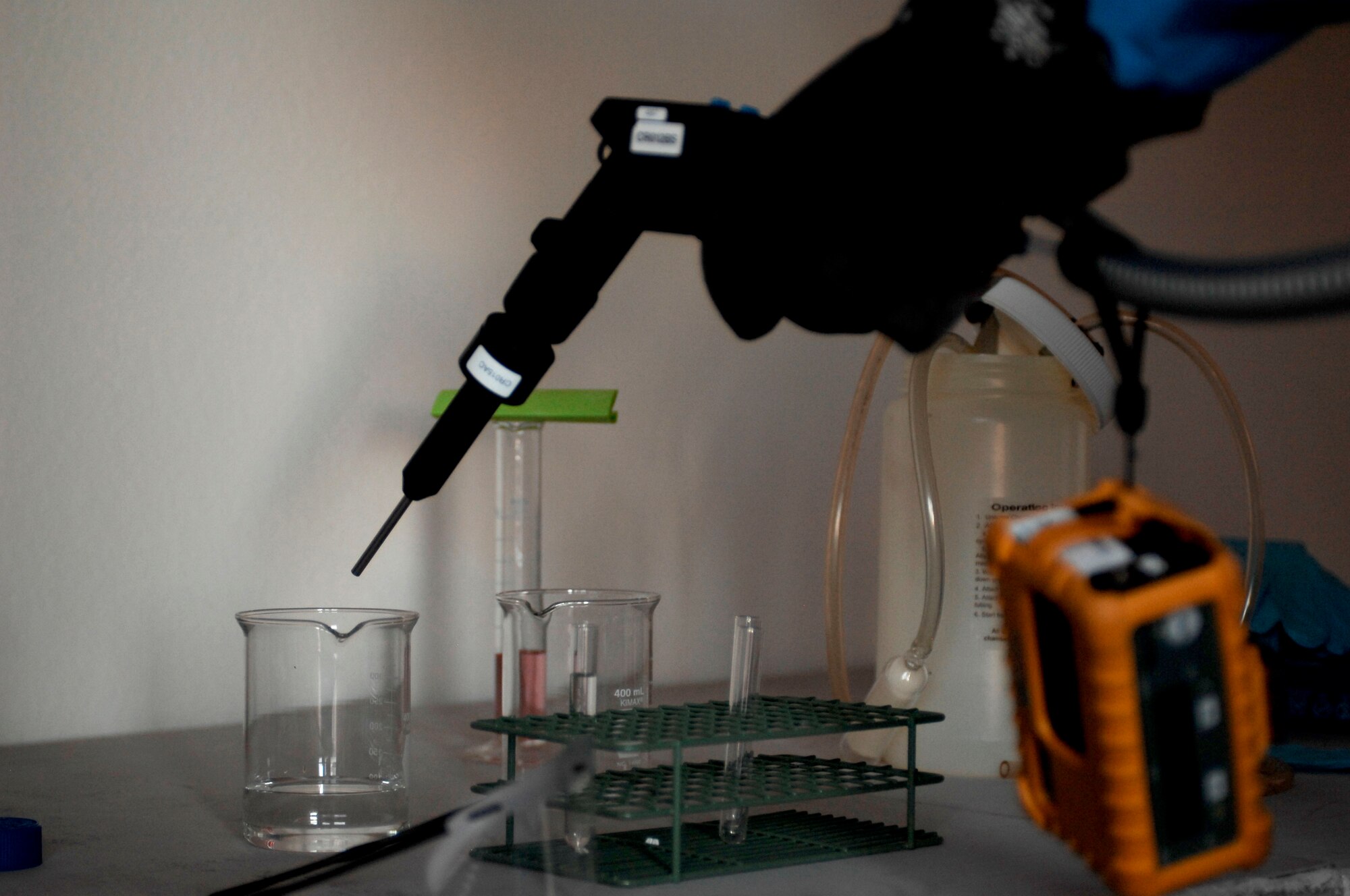 A Toxic Vapor Analyzer is used by the 355th Aerospace Medicine Squadron during a Integrated Base Emergency Response Capabilities Training exercise at Davis-Monthan Air Force Base, Ariz., Jan. 15, 2014. The entry team used the TVA to measure volatile organic compounds that will detect any hazardous chemicals that may be in the substances found. (U.S. Air Force photo by Airman 1st Class Cheyenne Morigeau/ Released)