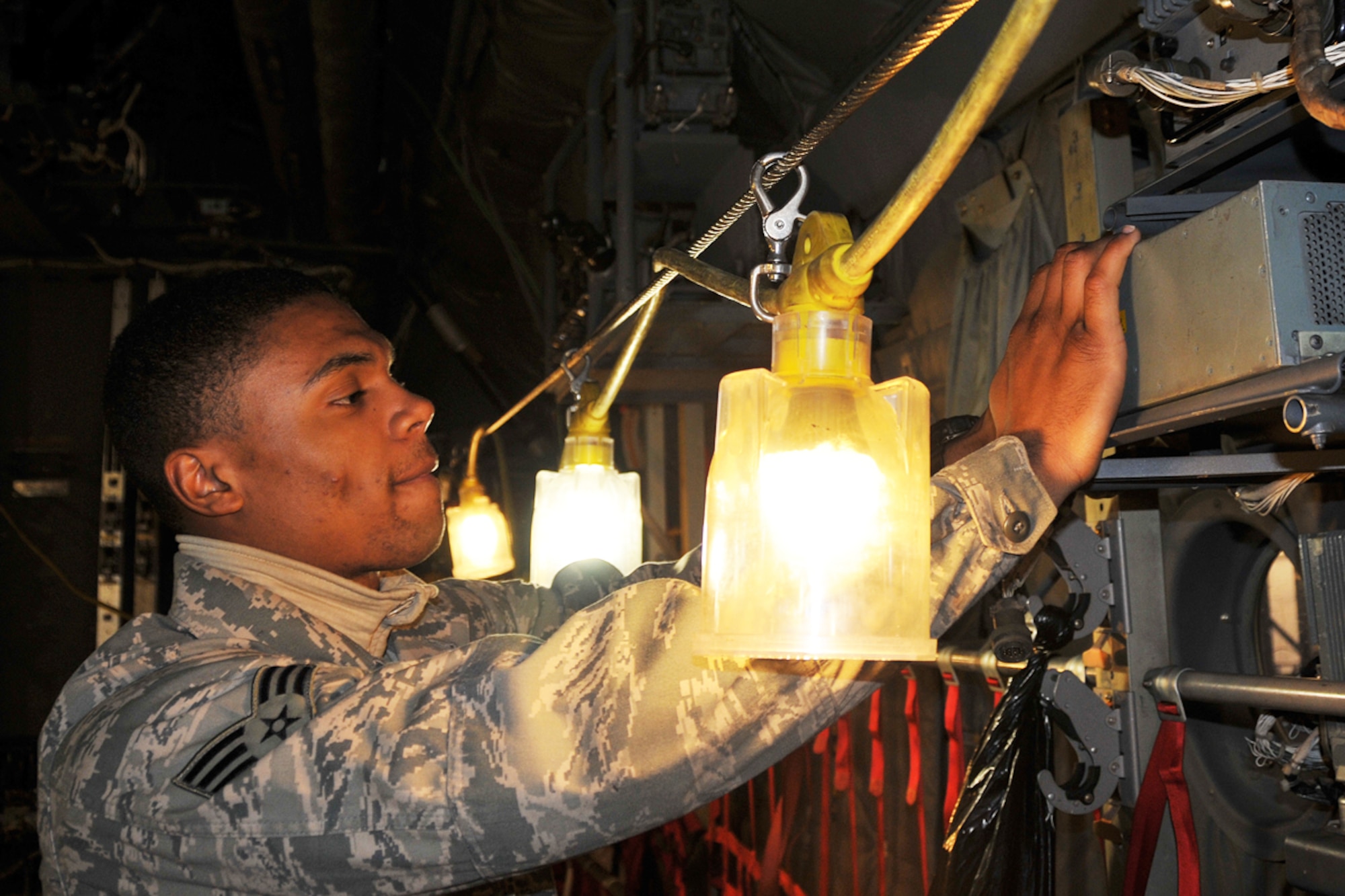 Senior Airman John Edwards IV is an electronic warfare systems specialist for the 94th Maintenance Squadron. He ensures that the electronic countermeasures on our C-130 aircraft are operational and guarded against threats. (U.S. Air Force photo/Senior Airman Elizabeth Van Patton) 