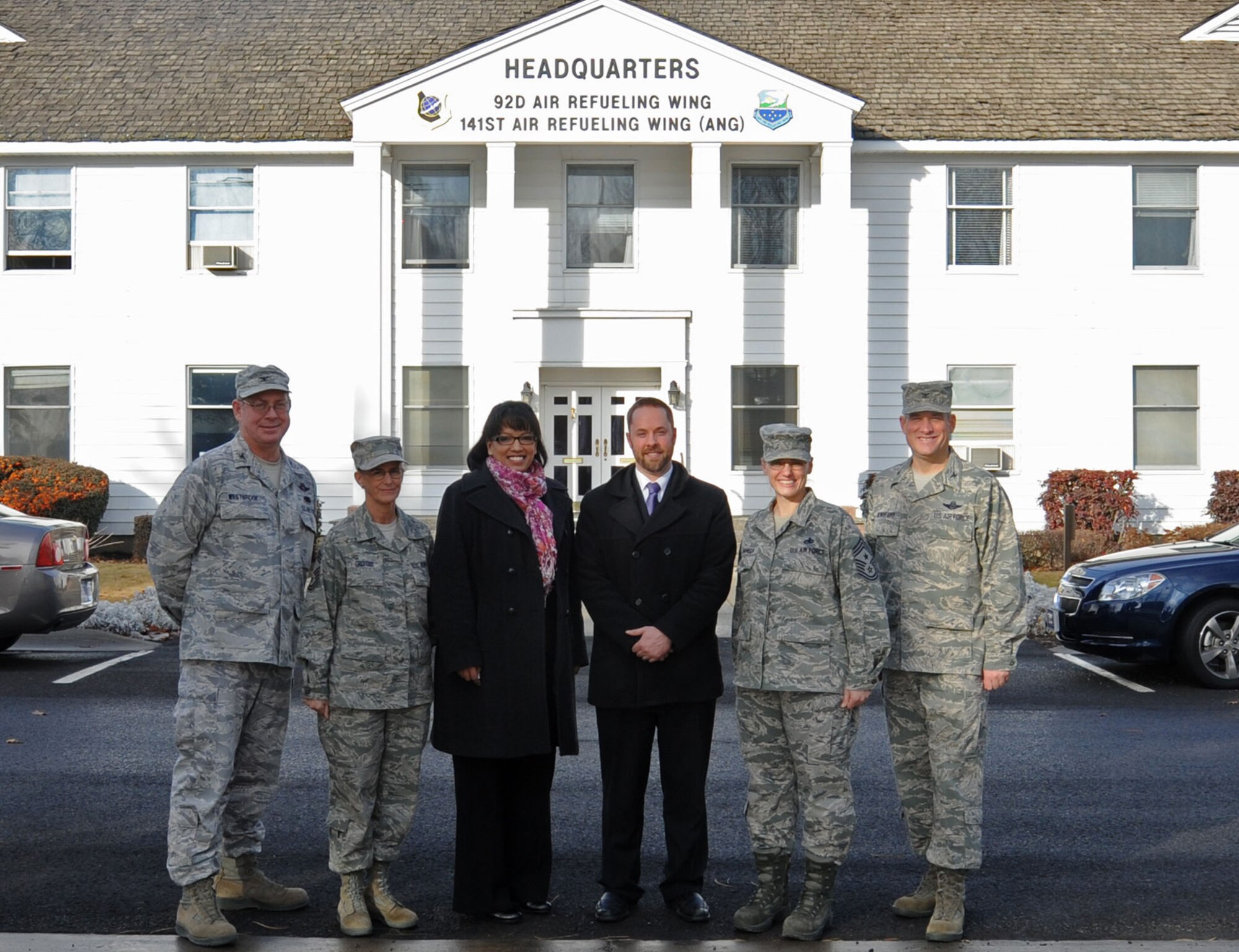 Leaders from Team Fairchild pose for a photo with Kristiné Reeves, Washington State Department of Commerce military and defense sector director, and John Culton, U.S. Senator Patty Murray's Eastern Washington director, at Fairchild Air Force Base, Wash., Jan. 14, 2013.  The staffers visited the base for a question and answer session with base leaders and a tour of the facilities.  (U.S. Air Force photo by Airman 1st Class Sam Fogleman/Released)