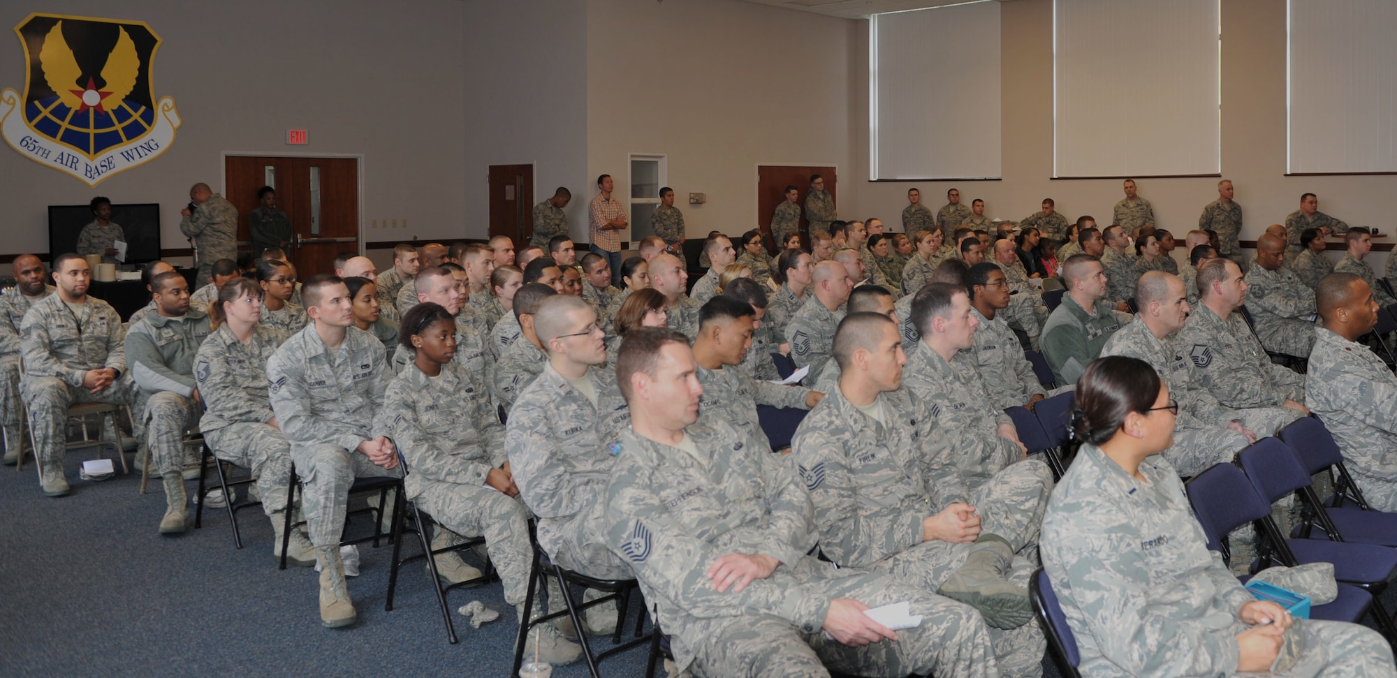 Members of the 65th Air Base Wing celebrated the life and achievements of Dr. Martin Luther King, Jr., with a Unity Service consisting of songs and speeches Jan.17, 2014. The event featured service members of various backgrounds discussing how Martin Luther King's civil rights efforts affected their cultures. Martin Luther King Day is observed the third Monday in January of each year. The annual theme is "A Day On, Not a Day Off." (U.S. Air Force photo by Staff Sgt. Angelique N. Smythe)