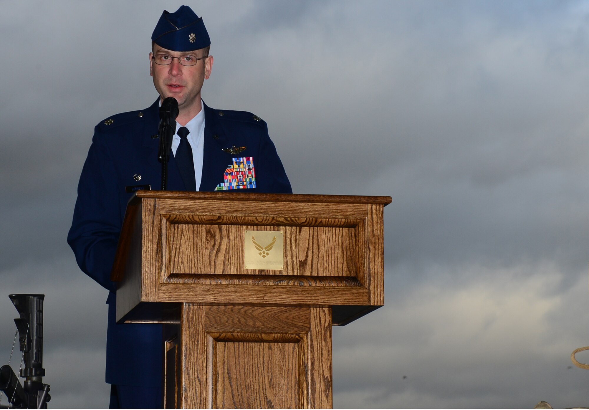 Lt. Col. Jared Herbert, 56th Rescue Squadron commander, speaks during a memorial service to honor four fallen Airmen on Jan. 17, 2014 at Royal Air Force Lakenheath, United Kingdom. The memorial service was held to honor Capt. Sean Ruane, Capt. Christopher Stover, Tech. Sgt. Dale Mathews and Staff Sgt. Afton Ponce, 56th Rescue Squadron, who were killed during an HH-60G Pave Hawk helicopter crash while performing a low-level training mission on the Norfolk coast Jan. 7, 2014. (U.S. Air Force photo by Airman 1st Class Erin O’Shea/Released)