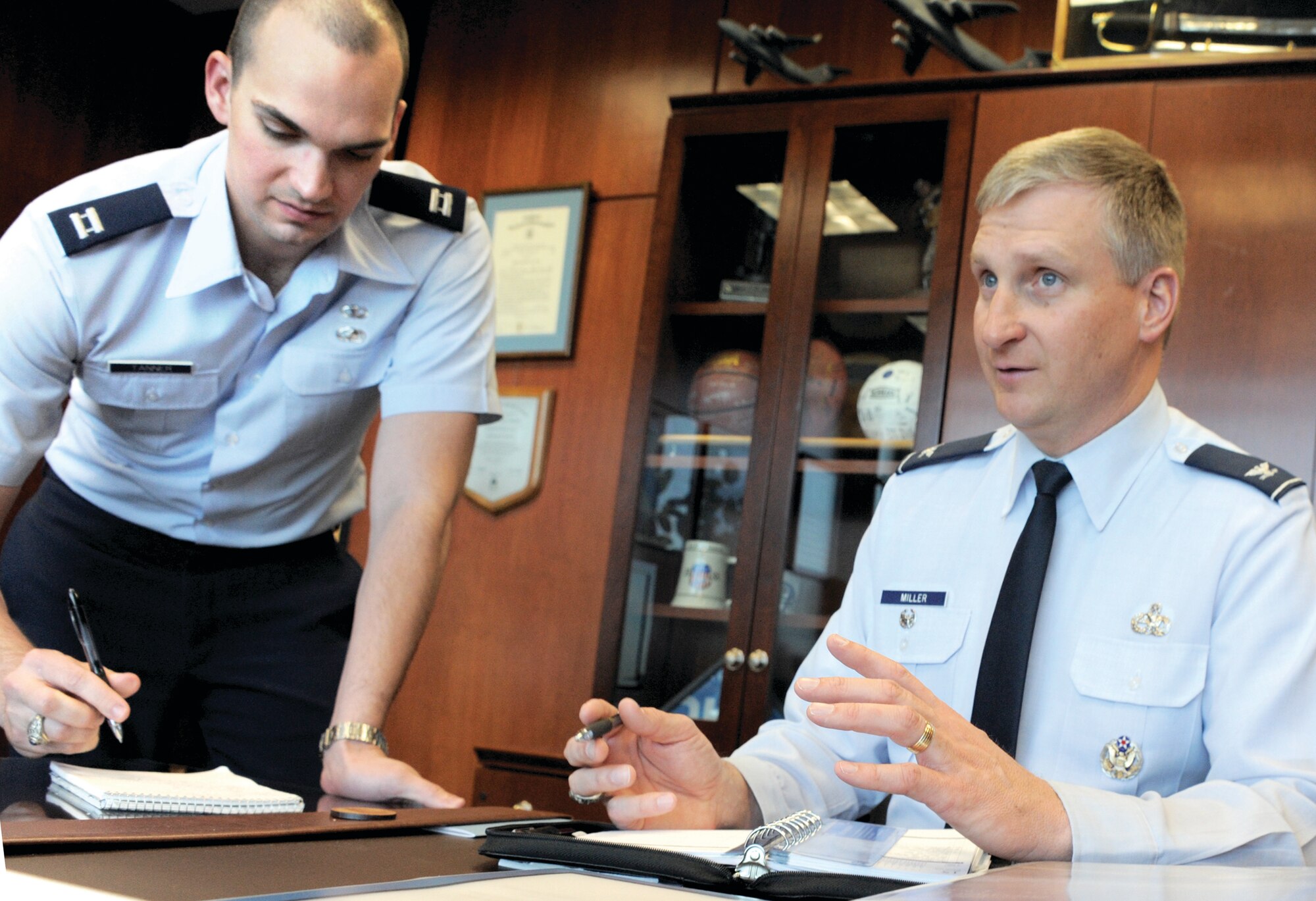 Col. Evan Miller, the U.S. Air Force Academy's vice-superintendent, chat with his aide, Capt. Michael Tanner Jan. 15. (U.S. Air Force Photo/Carol Lawrence)
