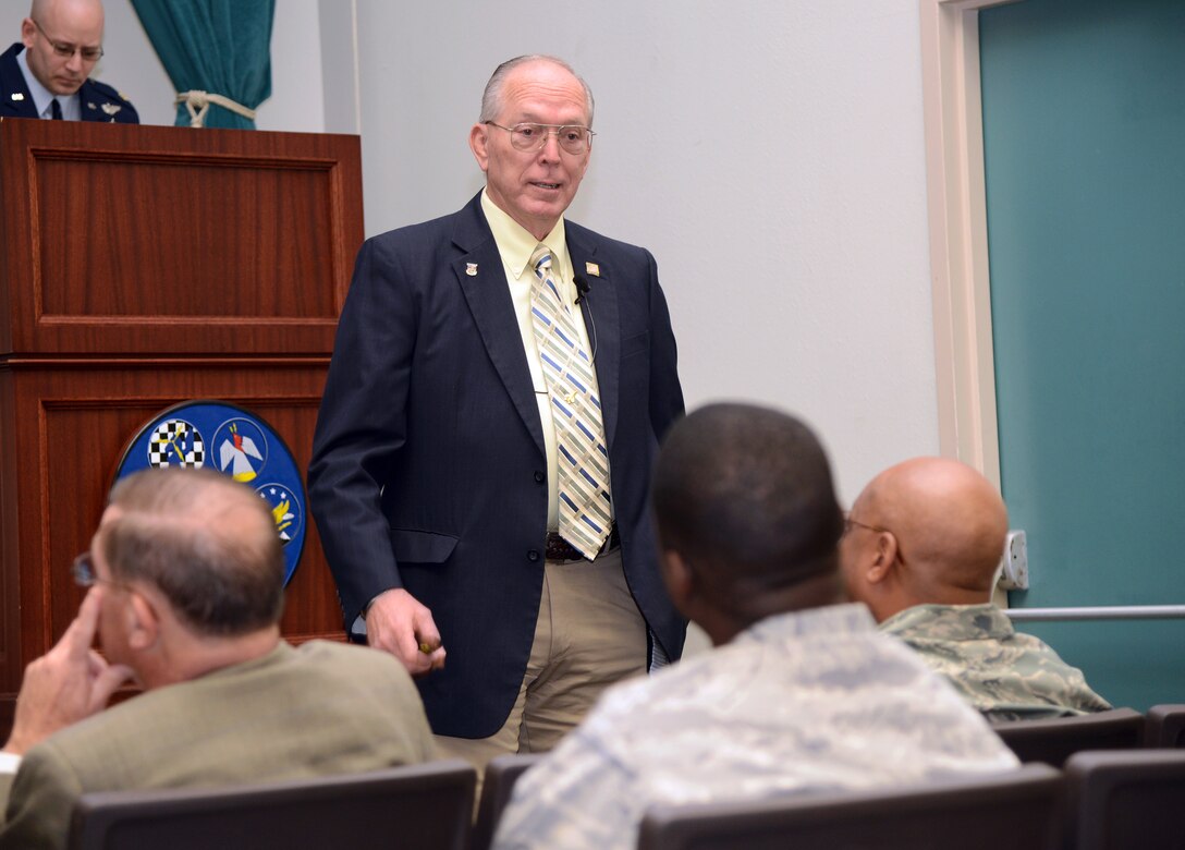Retired Lt. Col. William Schwertfeger spoke to members of the 552nd Air Control Wing on Tuesday in Fannin Hall about his distinguished Air Force career and the time he spent as a prisoner of war during the Vietnam War. Colonel Schwertfeger was on an air strike mission on Feb. 16, 1972, when his F-4 received intense anti-aircraft fire and he was forced to eject over North Vietnam. He was then taken as a POW and was released during Operation Homecoming on March 28, 1973, after spending 407 days in captivity. (Air Force photo by Kelly White)