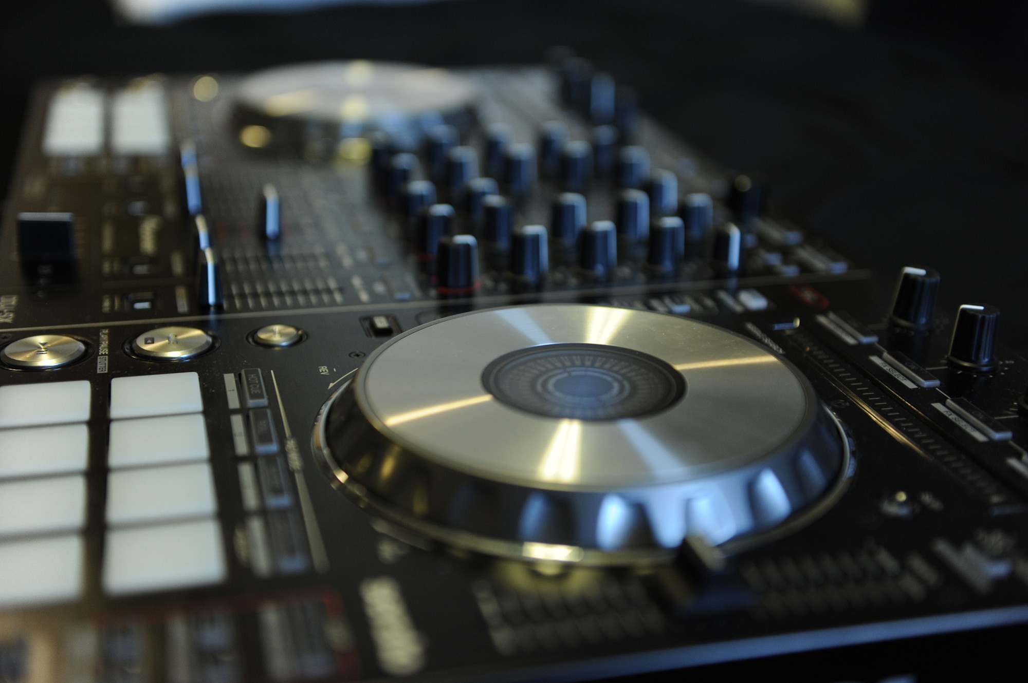 Above is a turntable on a mixing system Airman 1st Class Zackery Wade, 341st Comptroller Squadron financial technician, uses when he provides entertainment as a disc jockey. Wade has played at many events, including at the 2013 Operation Holiday Cheer party, various Airman’s Council events and at off-base locations including Machinery Row in Great Falls, Mont., and in Mississippi and Tennessee. (U.S. Air Force photo/Senior Airman Katrina Heikkinen)