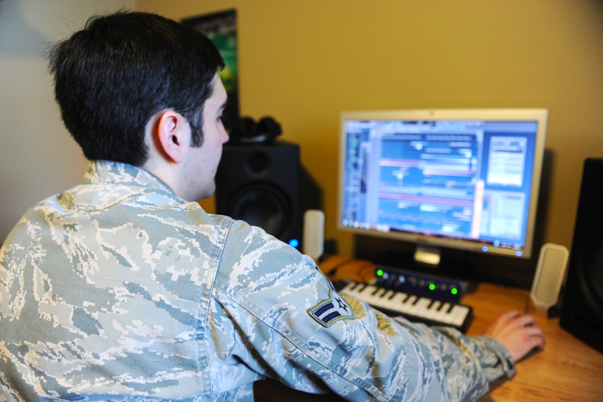 Airman 1st Class Zackery Wade, 341st Comptroller Squadron financial technician, uses music production software to edit an original song. Wade spends up to two months creating original music with electronic dance music sounds. (U.S. Air Force photo/Senior Airman Katrina Heikkinen)