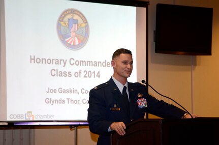 Col. Brett Clark, 94th Airlift Wing commander welcomes Honorary Commanders Association members, Class of 2014, and remarks about the programs value to both military and civilian communities during an HCA Installation Ceremony held at Dobbins Air Reserve Base, Ga., Jan. 15. (U.S. Air Force photo/Don Peek)