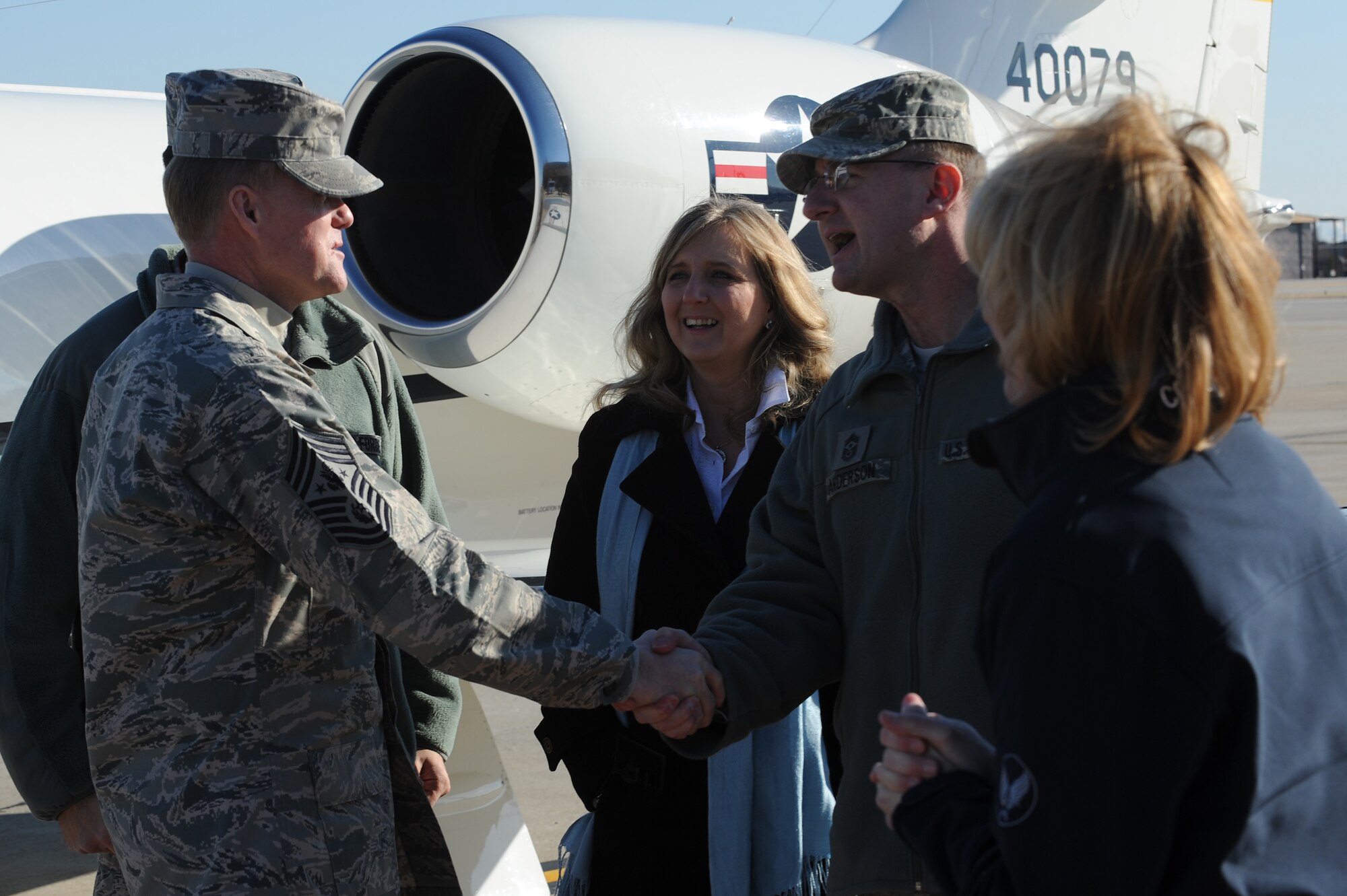 Command Chief Master Sgt. Marty Anderson greets Chief Master Sgt. of the Air Force James A.Cody on the flight line Jan. 15, 2014, Scott Air Force Base, Ill. Anderson is the command chief for the 375th Air Mobility Wing. (U.S. Air Force photo/Airman 1st Class Megan Friedl)
