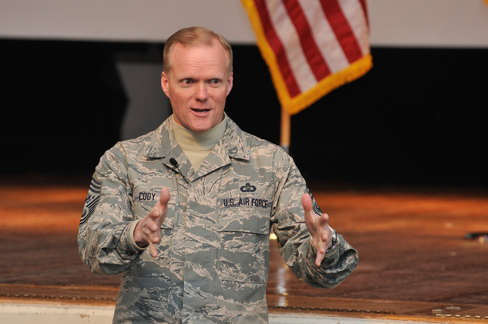 Chief Master Sgt. of the Air Force James A. Cody answers questions during an Airmen's Calll Jan. 15, 2014, at Scott Air Force Base, Ill. Cody discussed upcoming changes to the Air Force and the importance of leadership as the Air Force goes through force management programs. (U.S. Air Force photo/Staff Sgt. Jonathan Fowler)