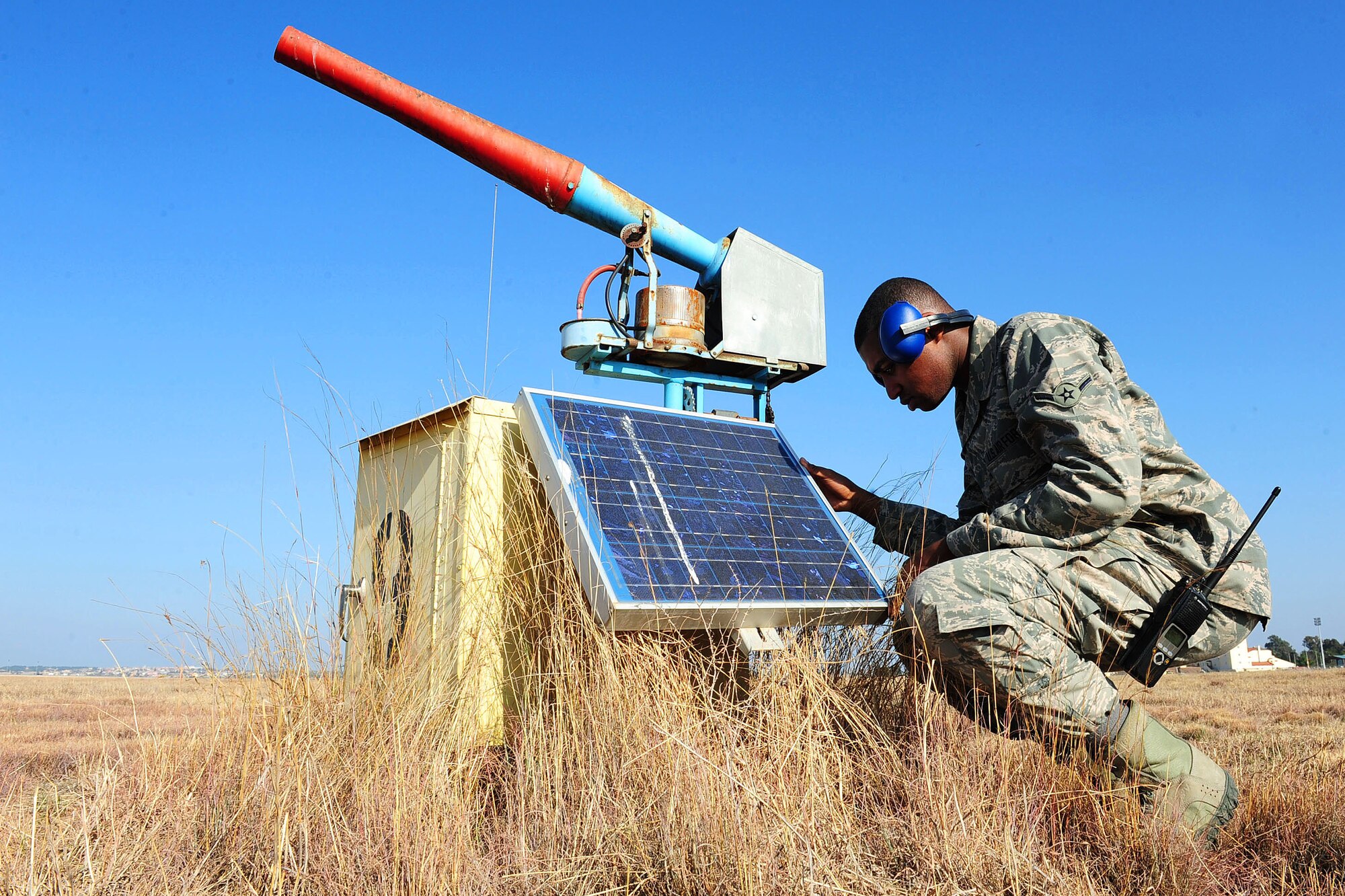 Airman Warren Washington, 39th Operations Squadron, airfield management operations coordinator inspects a Bird Aircraft Strike Hazard cannon Jan. 17, 2013, at Incirlik Air Base, Turkey.  Birds are a hazard to airfield operations because of the risk they pose in striking an aircraft.  BASH programs are established at airfields around the world to ensure the safety of those who are in flight and on the ground.  (U.S. Air Force photo by Airman 1st Class Nicole Sikorski/Released) 