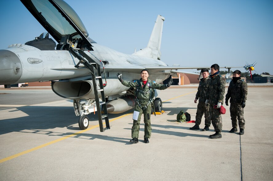 Republic of Korea air force Capt. Jun-Mong Yang, 123rd Fighter Squadron, arrives for exercise Buddy Wing 14-1 at Kunsan Air Base, Republic of Korea, Jan 14, 2014. Buddy Wing is a combined training exercise between U. S. Air Force and Republic of Korea air force pilots to improve communication and combat capabilities to strengthen the peninsula’s combined air power team. (U.S. Air Force photo by Senior Airman Clayton Lenhardt/Released)