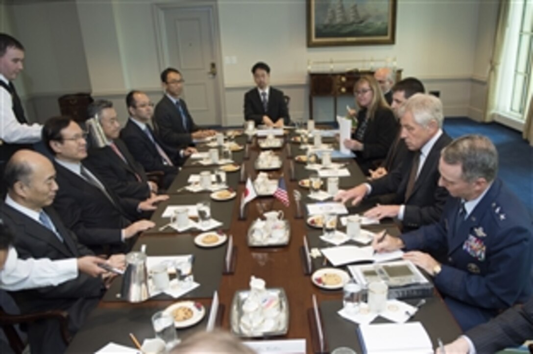 U.S. Defense Secretary Chuck Hagel, second on right, meets with Japanese National Security Advisor Shotaro Yachi, second on left, at the Pentagon, Jan. 17, 2014. The two leaders met to discuss issues of mutual interest.