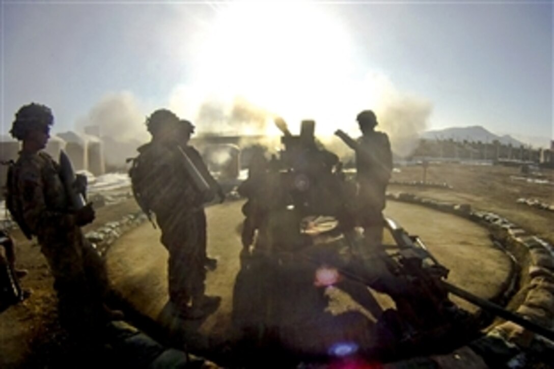 U.S. soldiers conduct a live-fire exercise on their M119 and M777 howitzers as they await a mission in Afghanistan, Jan. 15, 2014. The soldiers are assigned to the 10th Mountain Division's 4th Battalion 25th Field Artillery Regiment, 3rd Brigade Combat Team.