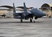 The 335th Expeditionary Fighter Squadron F-15E fighter aircraft flag ship parks after flying Air Force Maj 