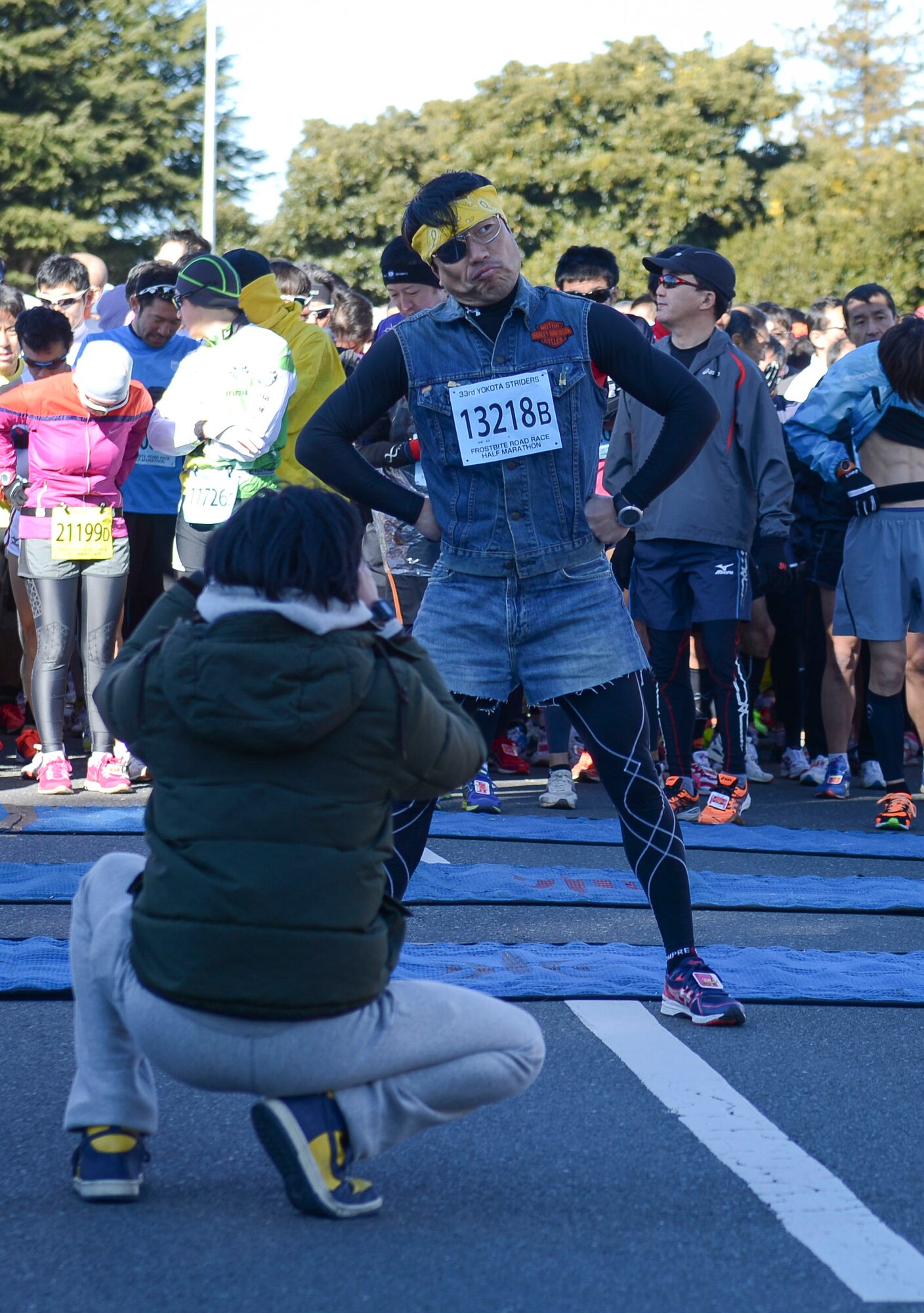 An off base resident poses for a photo before the half-marathon portion of the annual Frostbite Run begins at Yokota Air Base, Japan, Jan.19, 2014.  Each year many people dress up in costumes as they participate in the races. (U.S. Air Force photo by Airman 1st Class Meagan Schutter/Released)