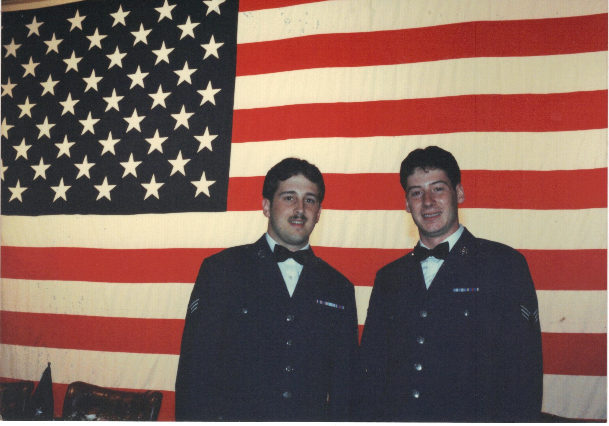 Chief Master Sgt. Richard Vogel, right, is pictured as a senior airman during a combat dining-in at the Challenger Club at Osan Air Base, Republic of Korea, 1987. Vogel earned five different promotions during his four tours in the ROK, and encourages others serving here to maintain the same fast-paced work ethic required at Osan as they transition to new assignments. (Courtesy Photo/Chief Master Sgt. Richard Vogel)
