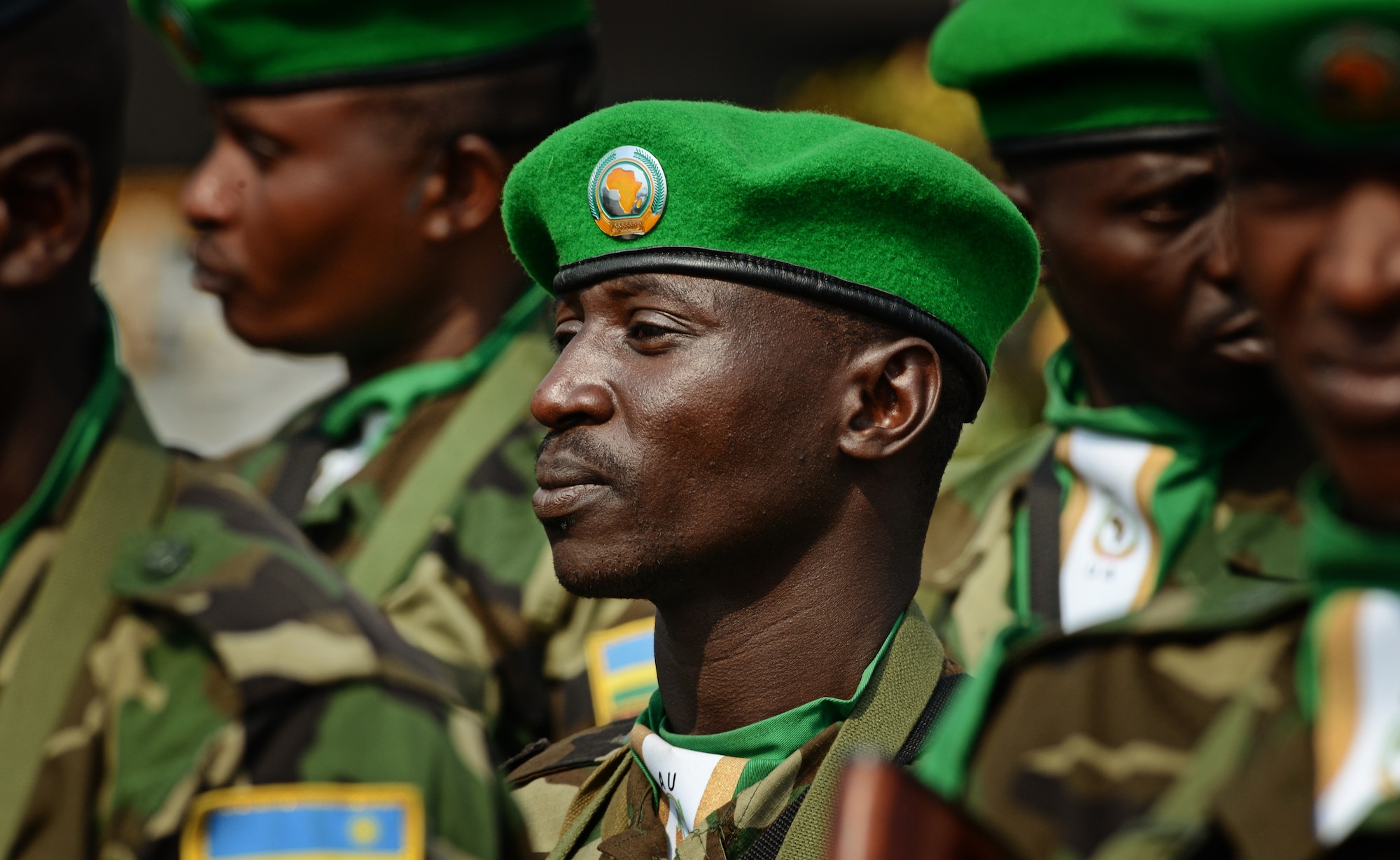 Rwandan soldiers stand in formation awaiting orders after being dropped off in the Central African Republic Jan. 19, 2014. U.S. forces will transport a total number of 850 Rwandan soldiers and more than 1,000 tons of equipment into the Central African Republic to aid French and African Union operations against militants during this three week-long operation. (U.S. Air Force photo/ Staff Sgt. Ryan Crane)